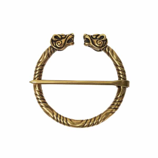 A gold-colored Boar Penannular Brooch featuring intricately designed dragon heads at each end and a central pin.