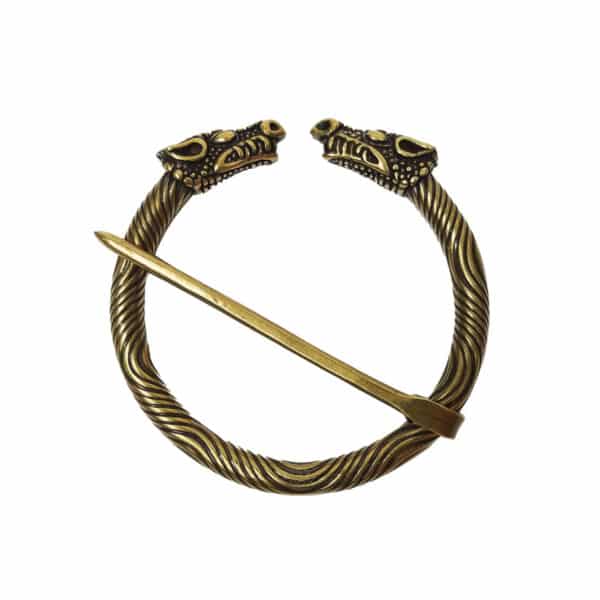 The Celtic Dragon Penannular Brooch features two intricately designed Celtic dragon heads and a central pin.