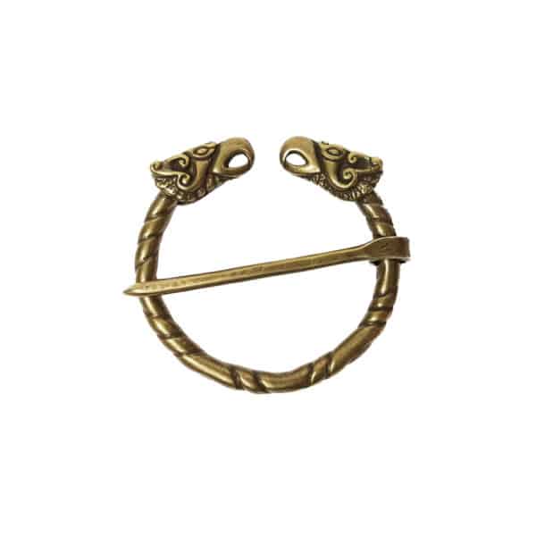 A Griffin Penannular Brooch crafted from bronze, featuring a twisted design, a decorative pin, and two griffin head motifs at the ends.