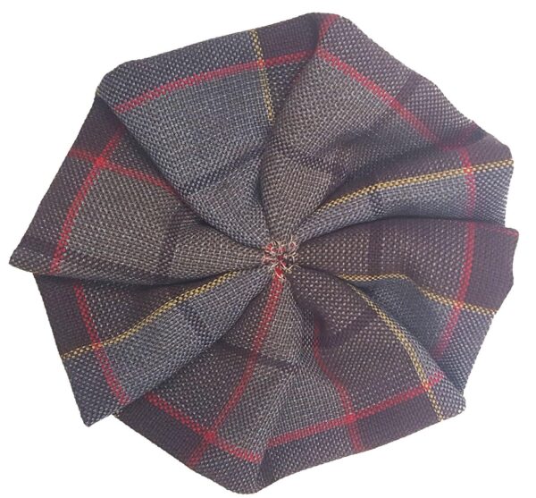 A plaid hat with a red, yellow, and brown OUTLANDER Tartan Rosettes - Premium Wool pattern.