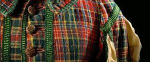 A Royal Scottish tartan coat on a mannequin.