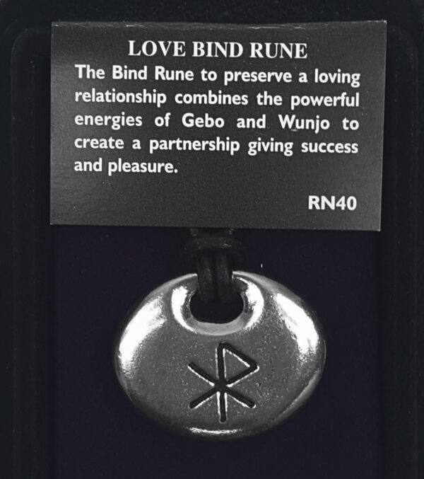 A Bind Rune Pewter Pendant is displayed, adorned with a sign above that reads: "The Love Bind Rune to preserve a loving relationship combines the powerful energies of Gebo and Wunjo.