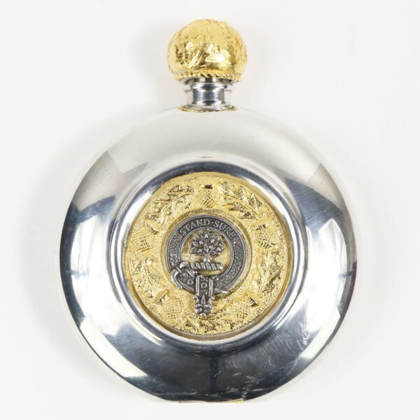 A silver and gold Anderson Clan Crest Flask - 24ct Gold Accents on a white surface.