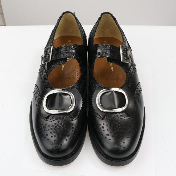 A pair of black leather buckle brogues shoes with metal buckles - Size 11.