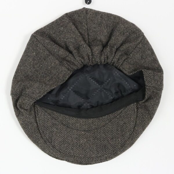 A grey tweed driving/golf cap.