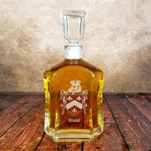 An Irish Coat of Arms 23.75oz Decanter and Whisky Glass Set with a coat of arms on it.