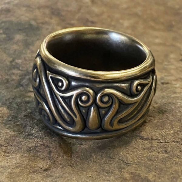 A Druid's Ring with an ornate design on it.