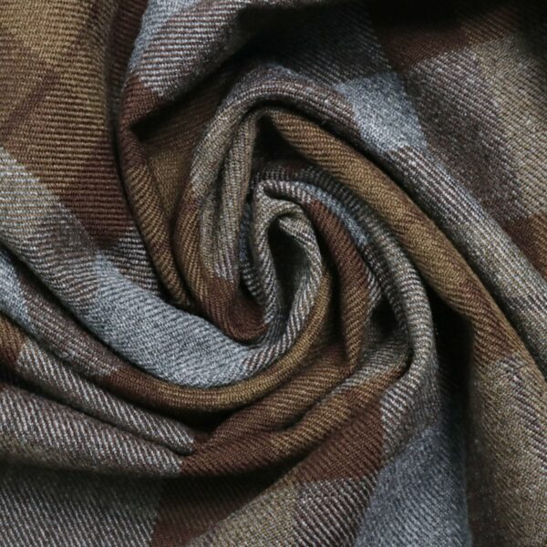 A close up of a brown and grey plaid fabric used in the Outlander Neck Warmer Cowl - Wool Free Poly/Viscose.