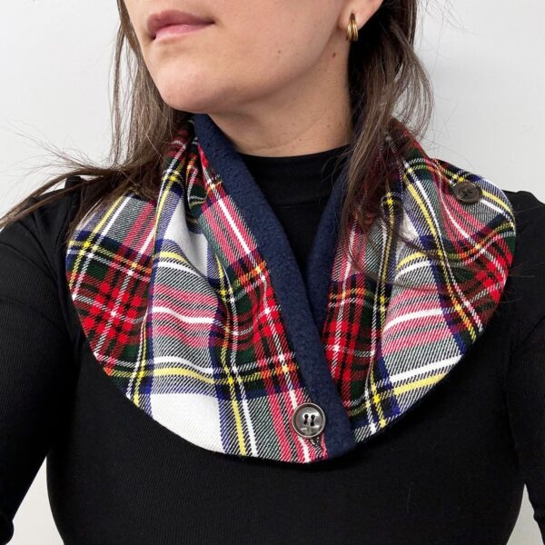 A woman wearing a Neck Warmer Cowl - Homespun Wool-Blend scarf.