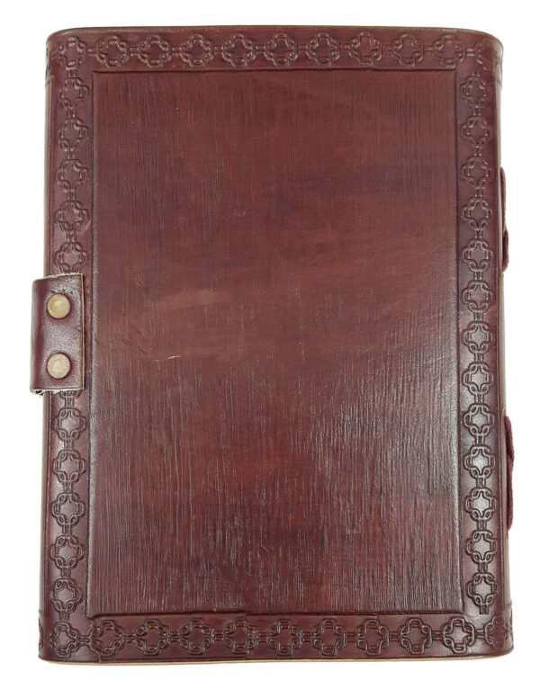 A Leather-Bound Greenman Journal - Old Display with an ornate design.