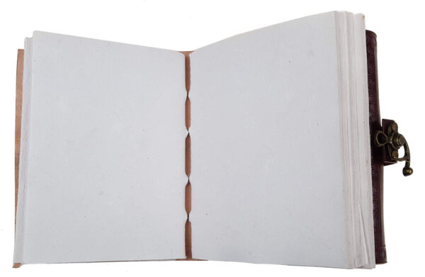 A Leather-Bound Celtic Cross Journal - Old Display featuring a celtic cross design, placed on a white background.