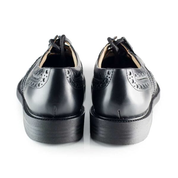A pair of black Leather Sole Ghillie Brogues on a white background.