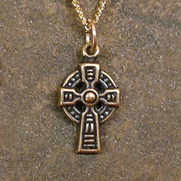 A Celtic Cross Pendant on a chain, crafted with gold.
