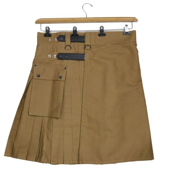 An Olive Green Canvas Utility Kilt - 36W 19L hanging on a hanger.