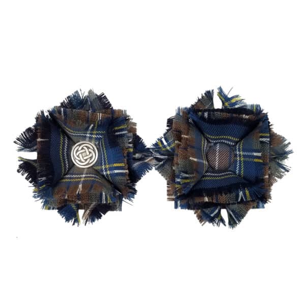 A pair of blue and brown Premium Tartan Corsages featuring a button.