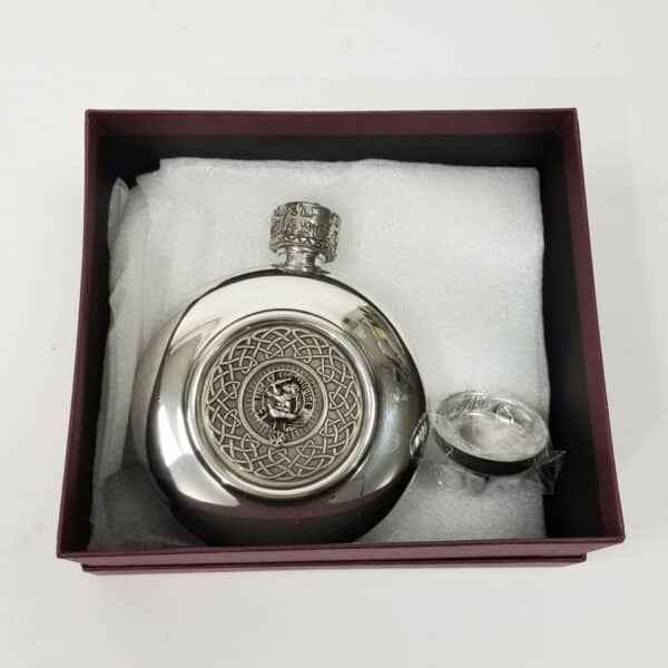 An Farquharson Clan Crest Antiqued Pewter flask and spoon in a silver box.