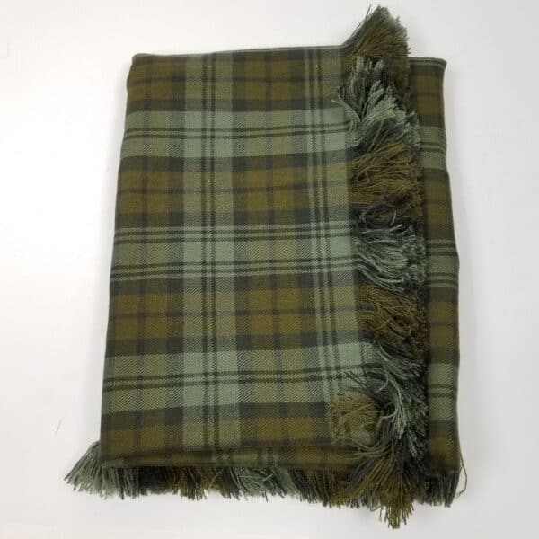 A Black Watch Weathered Homespun Wool-Blend Tartan Fly Plaid with fringes.