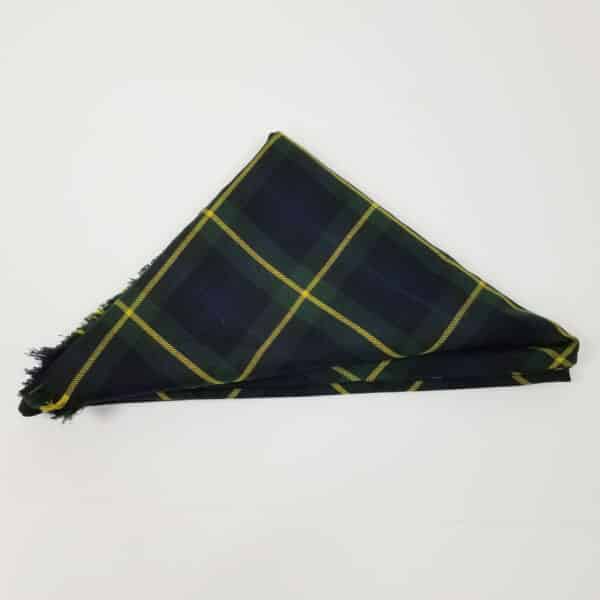A green and yellow Premium Wool Tartan Poncho 11oz on a white surface. Lightweight.