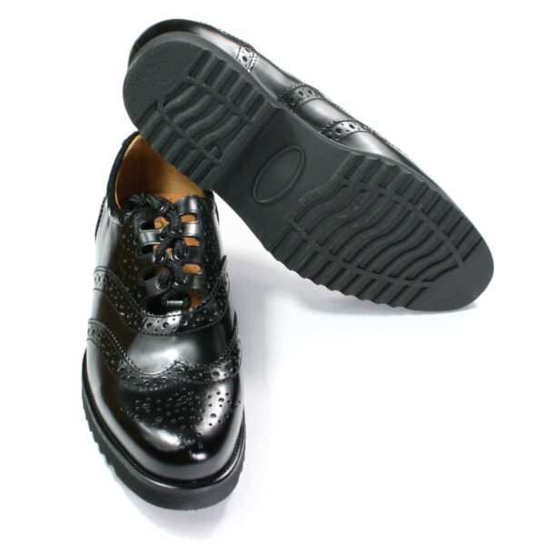A pair of men's black Light Weight Piper Brogues oxford shoes on a white background.