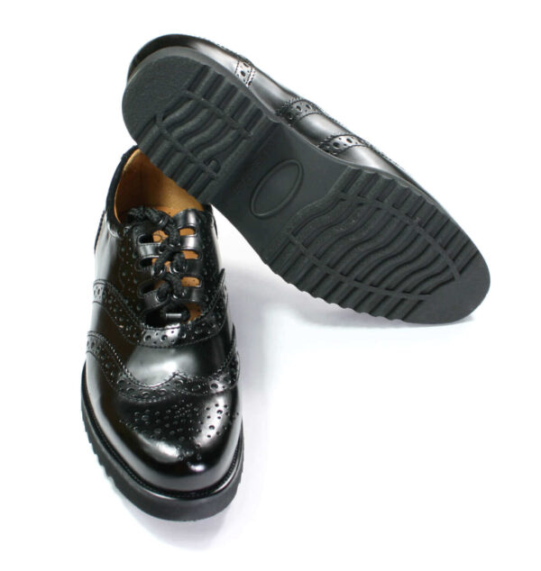 A pair of men's black Light Weight Piper Brogues oxford shoes on a white background.