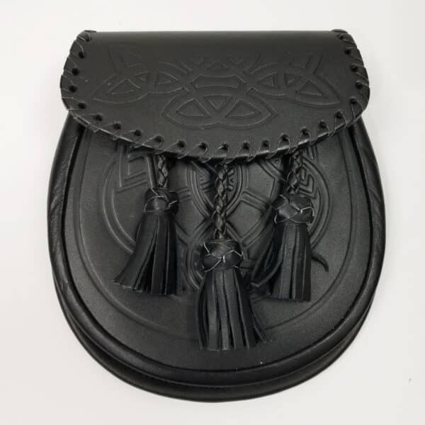 The Celtic Knot Braided Sporran is our best-selling black leather kilt bag with tassels.