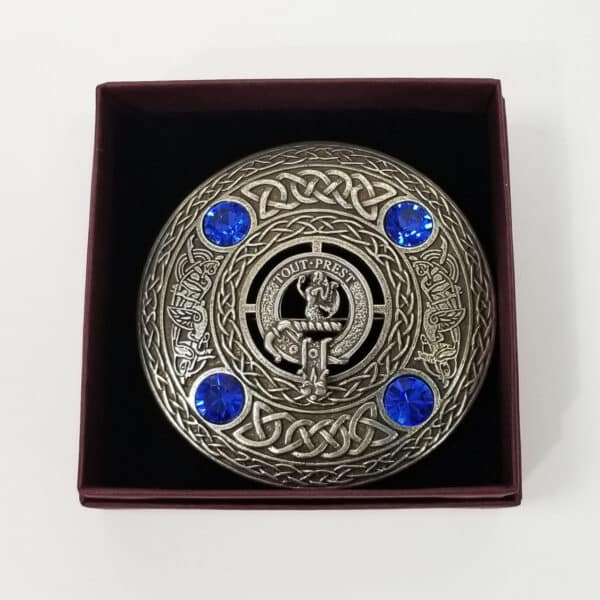 Keywords: Silver buckle, blue crystals
Product Name: Murray Clan Crest Plaid Brooch

Revised sentence: Murray Clan Crest Plaid Brooch features a silver buckle and blue crystals.