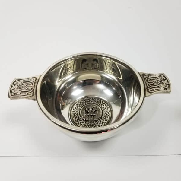 A Ferguson Clan Crest Quaich - 4 Inch, a silver bowl with an ornate design on it.