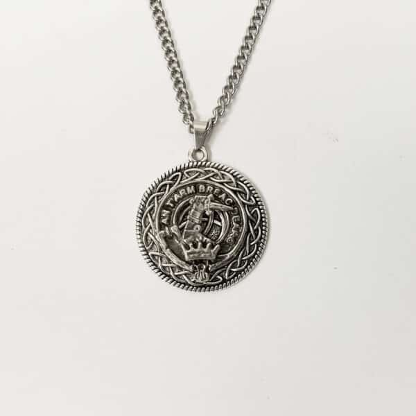MacQuarrie clan crest necklace with skull and crossbones design on a white background.