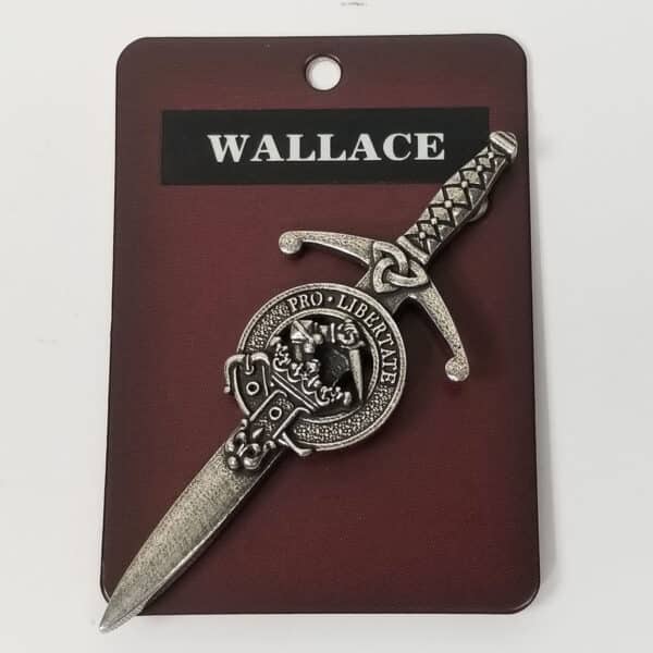 A decorative Wallace Pewter Clan Crest Kilt Pin displayed on a card.