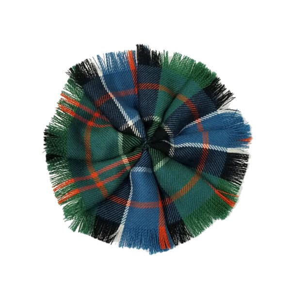 A top view of a Fringed Tartan Rosette - Light Weight 11oz Premium Wool flat cap.