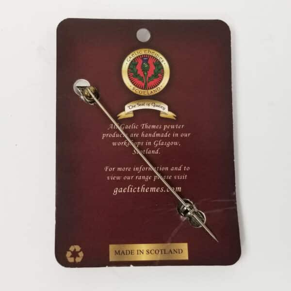 A Celtic-themed pewter **Law Enforcement Kilt Pin** on a card describing it as handmade in Glasgow, Scotland by Gaelic Themes, with a website listed for more information.