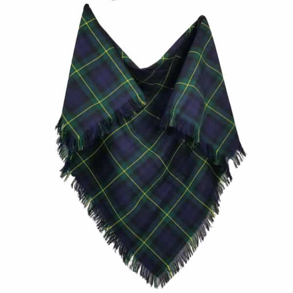 The Gordon Modern Premium Wool Shawl is a contemporary triangular scarf featuring a green, blue, and yellow plaid pattern with fringed edges, displayed hanging against a white background.