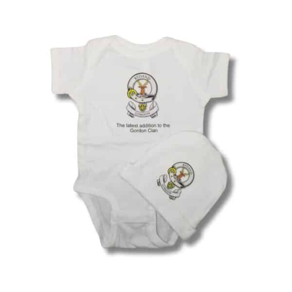 White Gordon Clan Onesie & Hat Set featuring "The latest addition to the Gordon Clan" text and a family crest design—perfect for your little one!