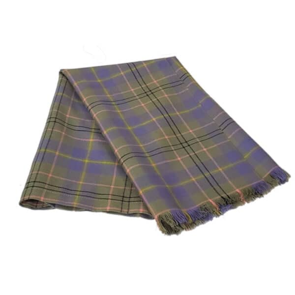 Displayed on a white background is a folded tartan scarf with a green, purple, and orange plaid pattern reminiscent of the Taylor Ancient Wool Tartan REMNANTS style, featuring fringed edges.