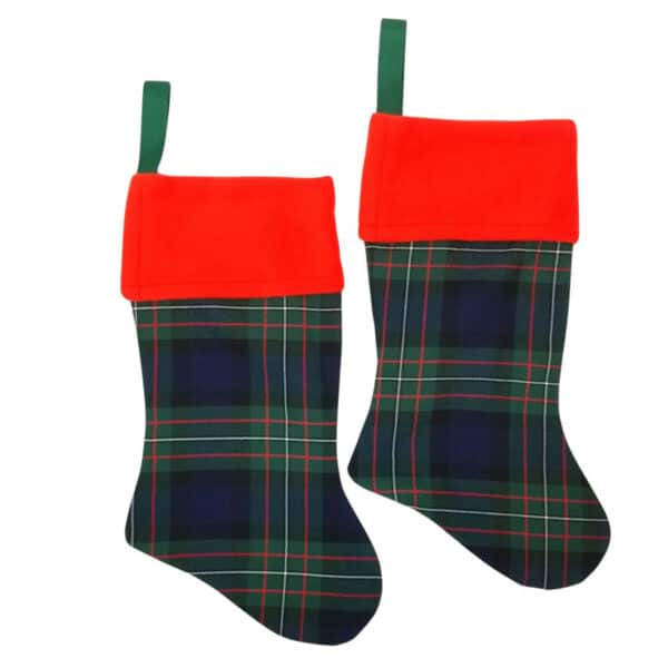 Two Ferguson Modern Tartan Stockings, featuring red cuffs and green hanging loops, are displayed side by side against a plain white background.