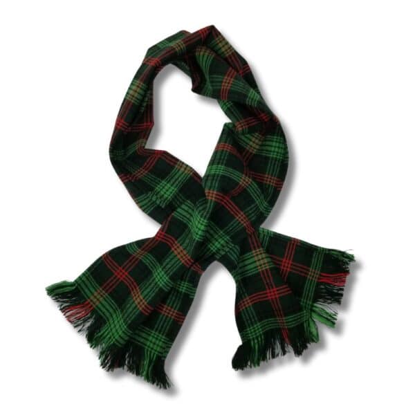 The Ross Hunting Green Scarf - Small Flaw, featuring a pattern of red and black intertwined hues with fringed ends, is elegantly draped in a loop on a white background.