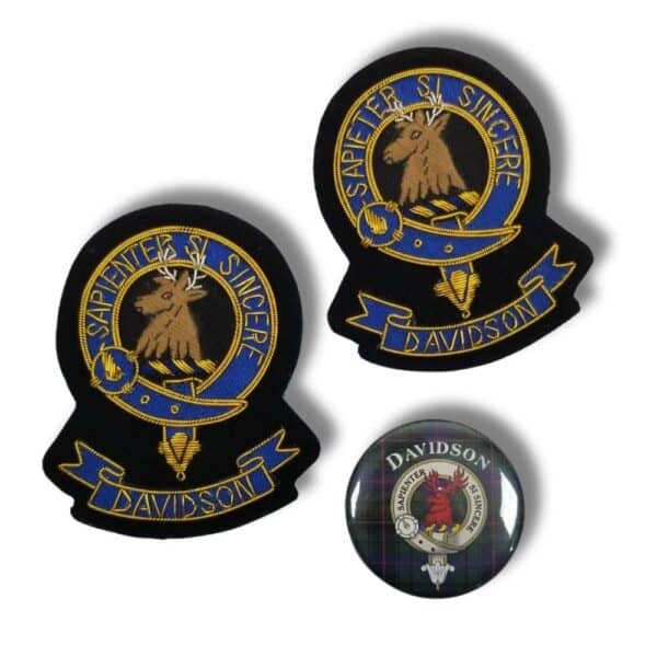 Two embroidered patches from the Davidson clan, featuring their crest and motto "Sapienter Si Sincere," are accompanied by a pin badge that shares a similar design set against a tartan background, showcasing both Davidson and Armstrong Clan heritage.