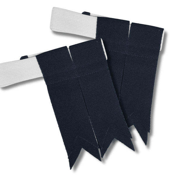 A pair of uniform shoulder epaulettes in navy blue, featuring grosgrain flashes on a pristine white background and a white strap.