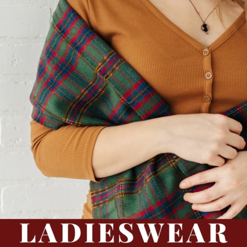 Welcome to the Celtic Croft, where you can find a fantastic collection of ladieswear! Explore our range of high-quality clothing items and accessories, such as our fashionable woman wearing a plaid scarf.