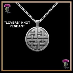 A celtic knot pendant with the words lover's knot.