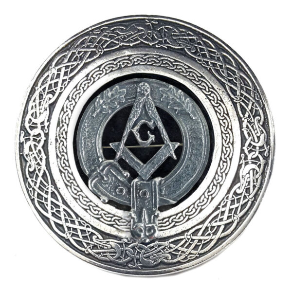 The Masonic Round Pewter Kilt Belt Buckle is shown on a round silver plate.