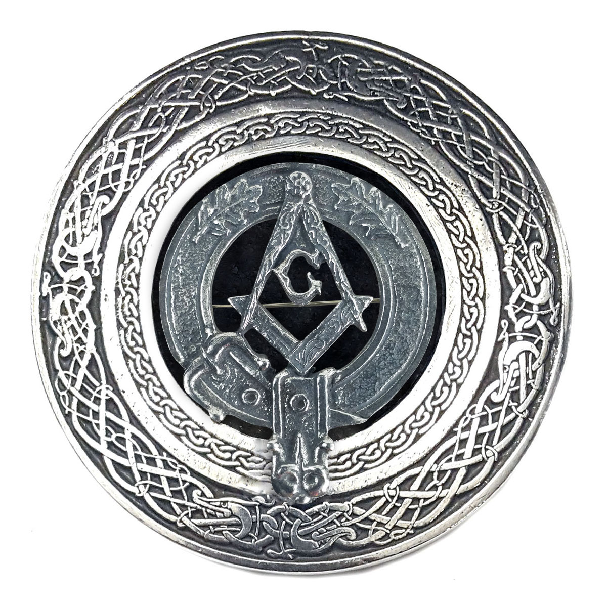 The Masonic Round Pewter Kilt Belt Buckle is shown on a round silver plate.