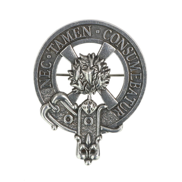 A silver Clergy Cap Badge/Brooch with a lion on it.