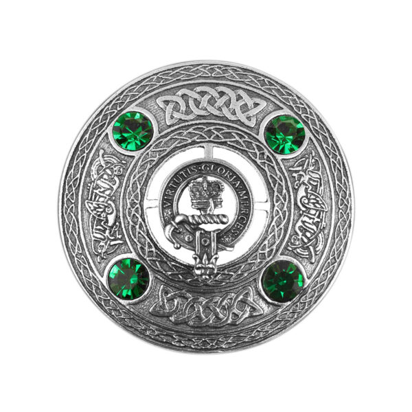 An Irish Coat of Arms Plaid Brooch with emerald stones.