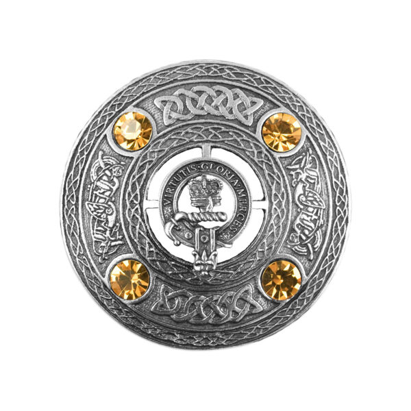 An Irish Coat of Arms plaid brooch with yellow crystals.