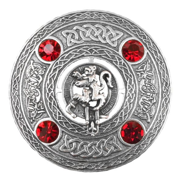 A Scottish claddagh belt buckle with red stones, featuring a Rampant Lion Plaid Brooch.
