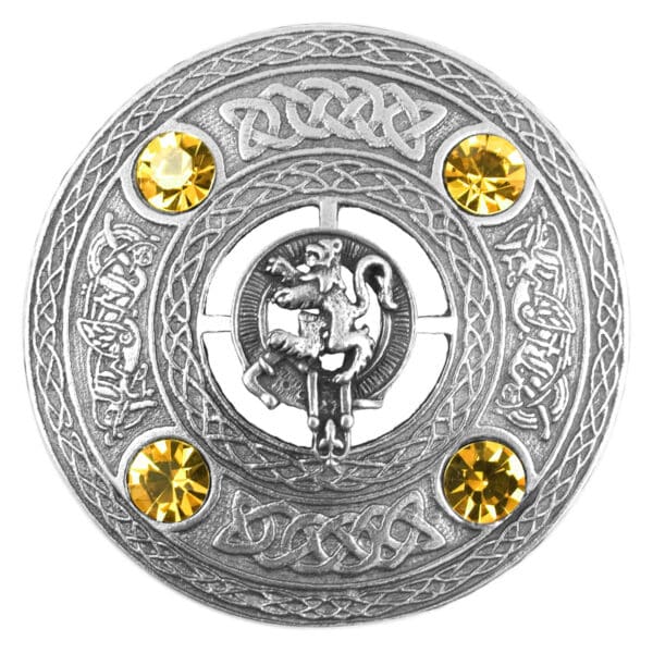 An image of a Celtic belt with yellow stones and a Rampant Lion Plaid Brooch.