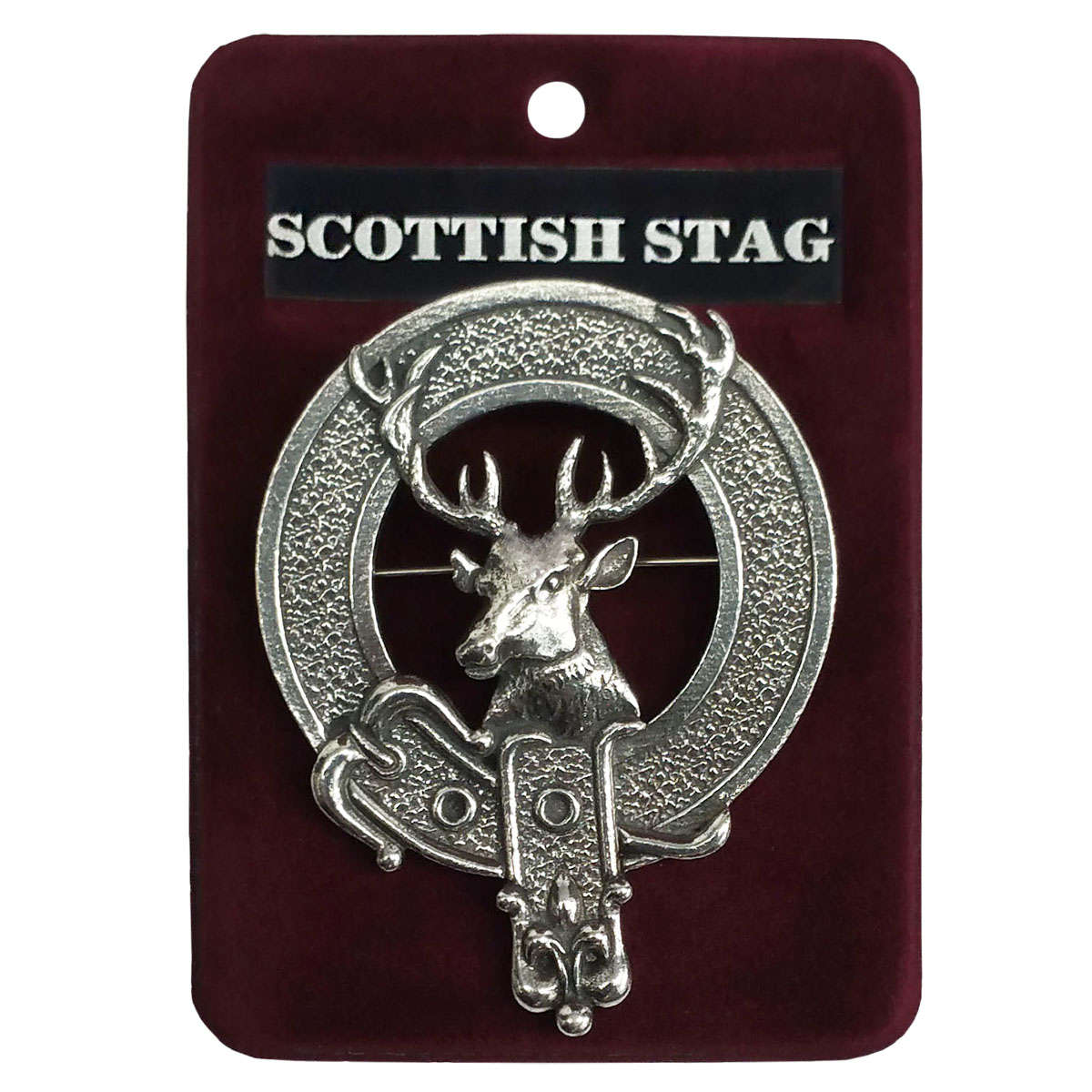A Scottish Stag Cap Badge/Brooch with a deer on it.