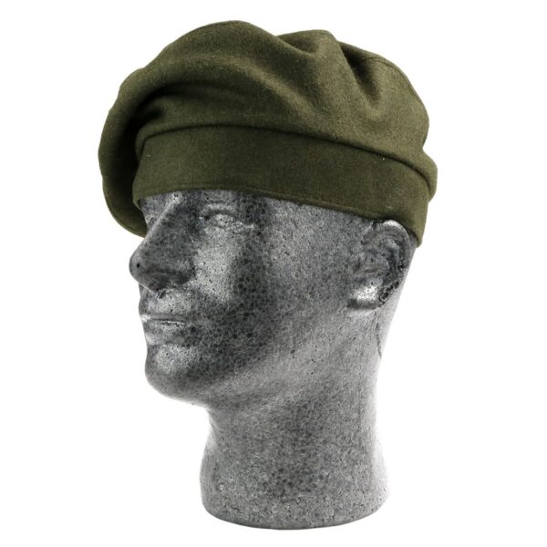 The head of a mannequin wearing an olive green beret with a Khaki Military-Style Balmoral/Tam.