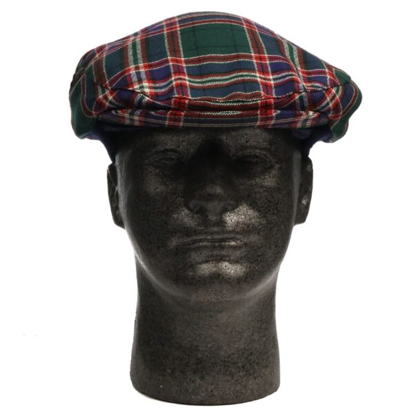 A mannequin wearing a green and red tartan hat.